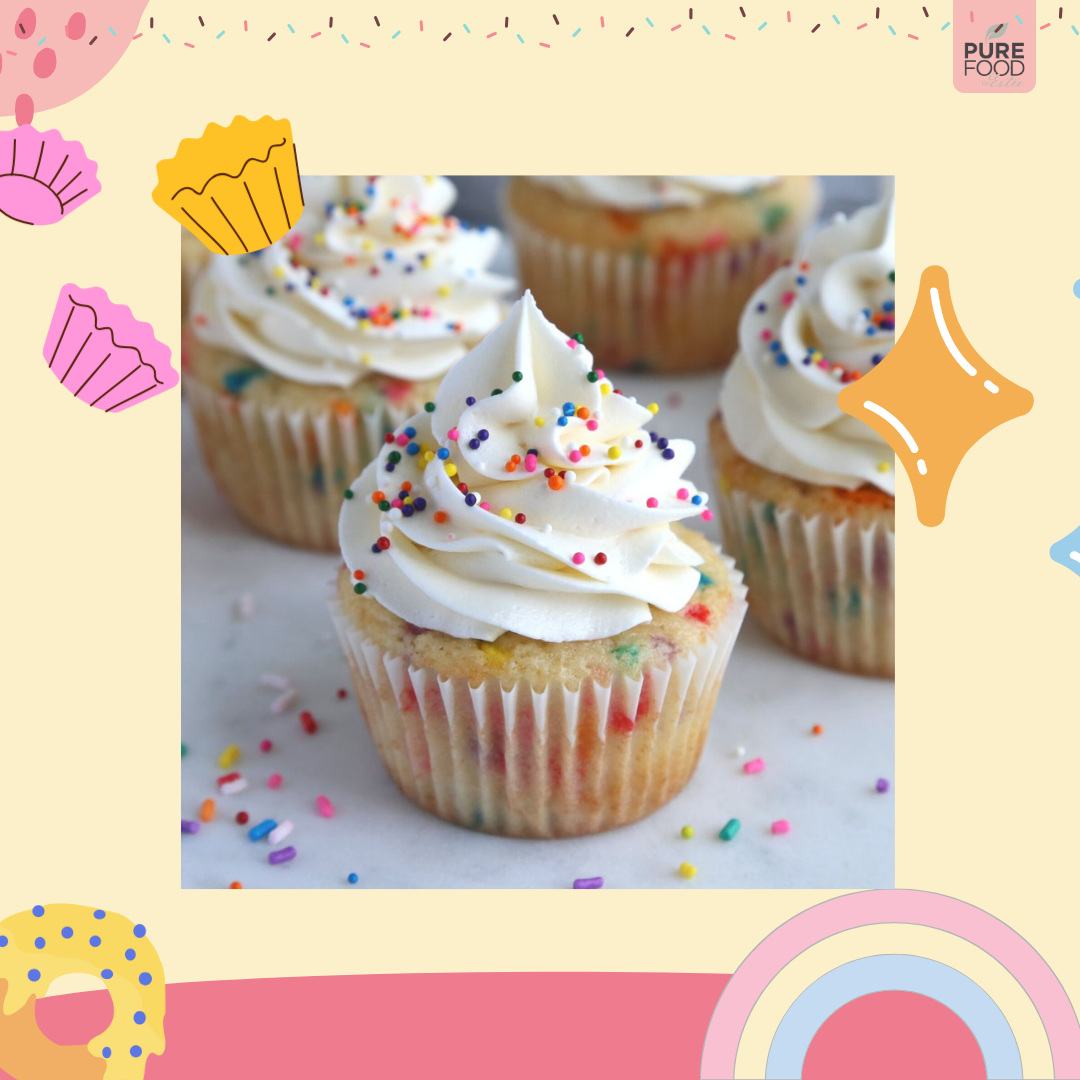 a picture of cupcakes with white frosting and sprinkles